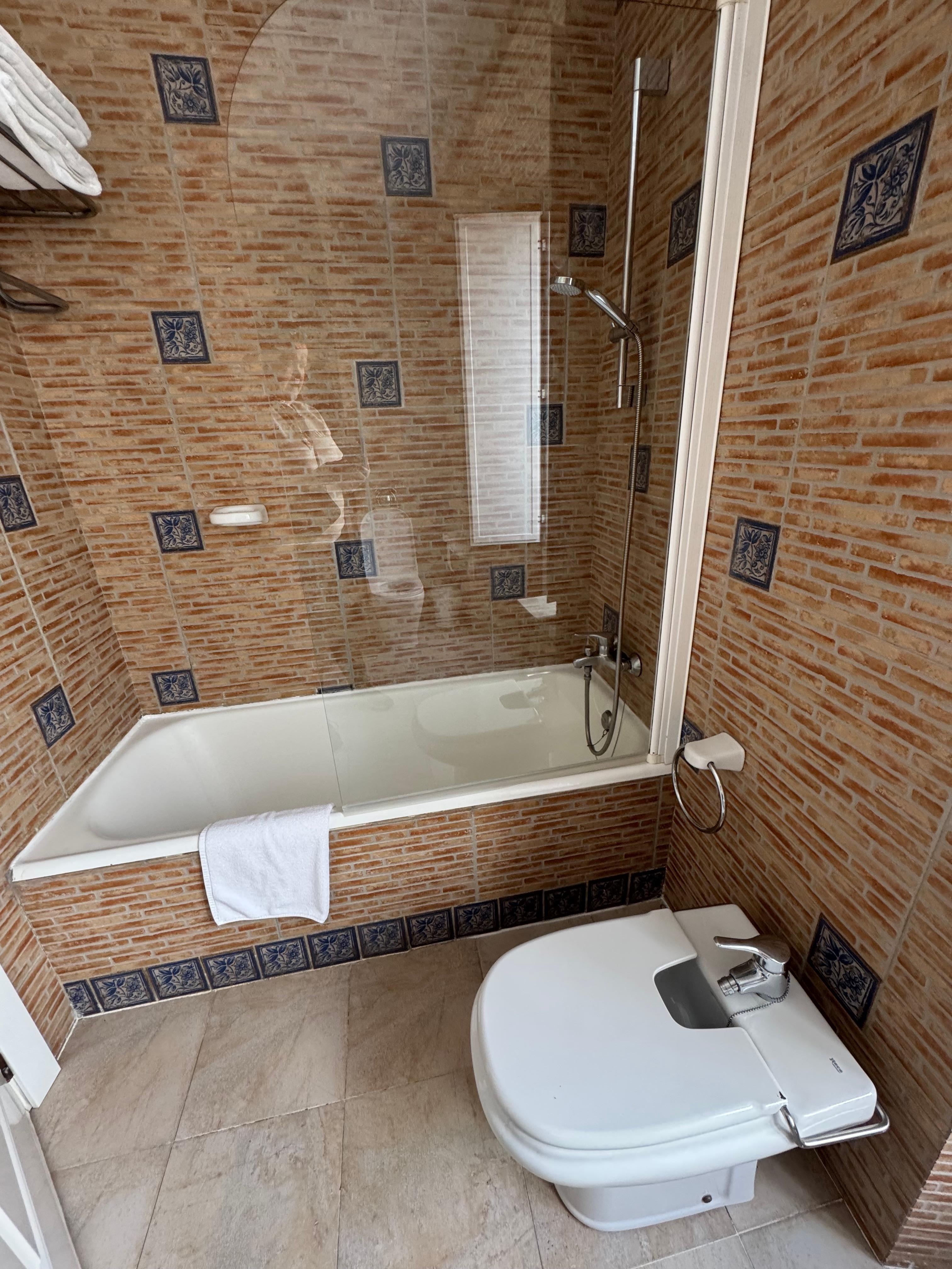 Bathroom with bathtub and good shower