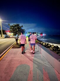 Walking back from a local restaurant, along the ocean.