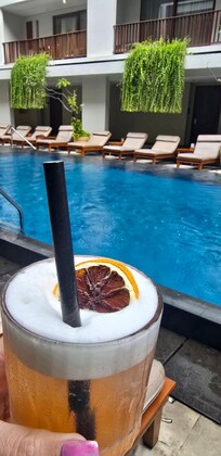 Cocktails by the pool. Staff are amazing!! Great location. Clean and beautiful style.