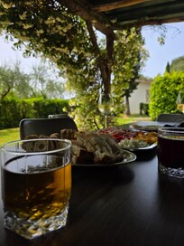 Under the pergola enjoying a meal
