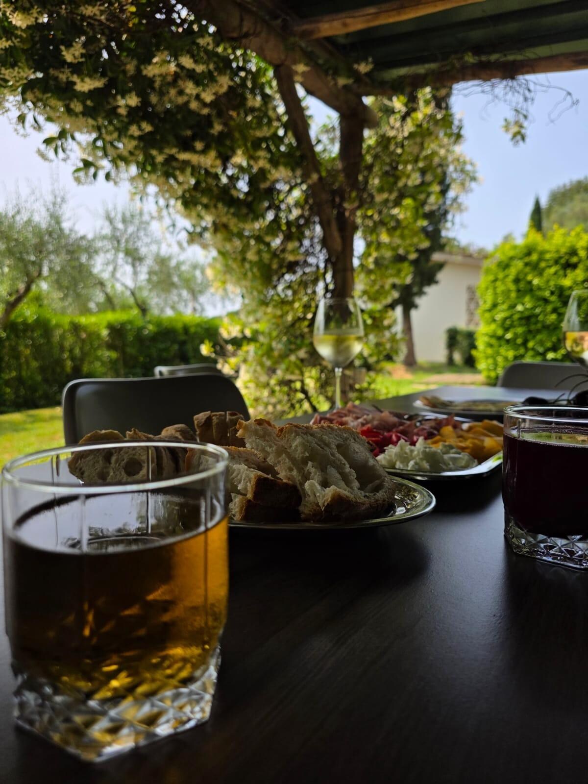 Under the pergola enjoying a meal