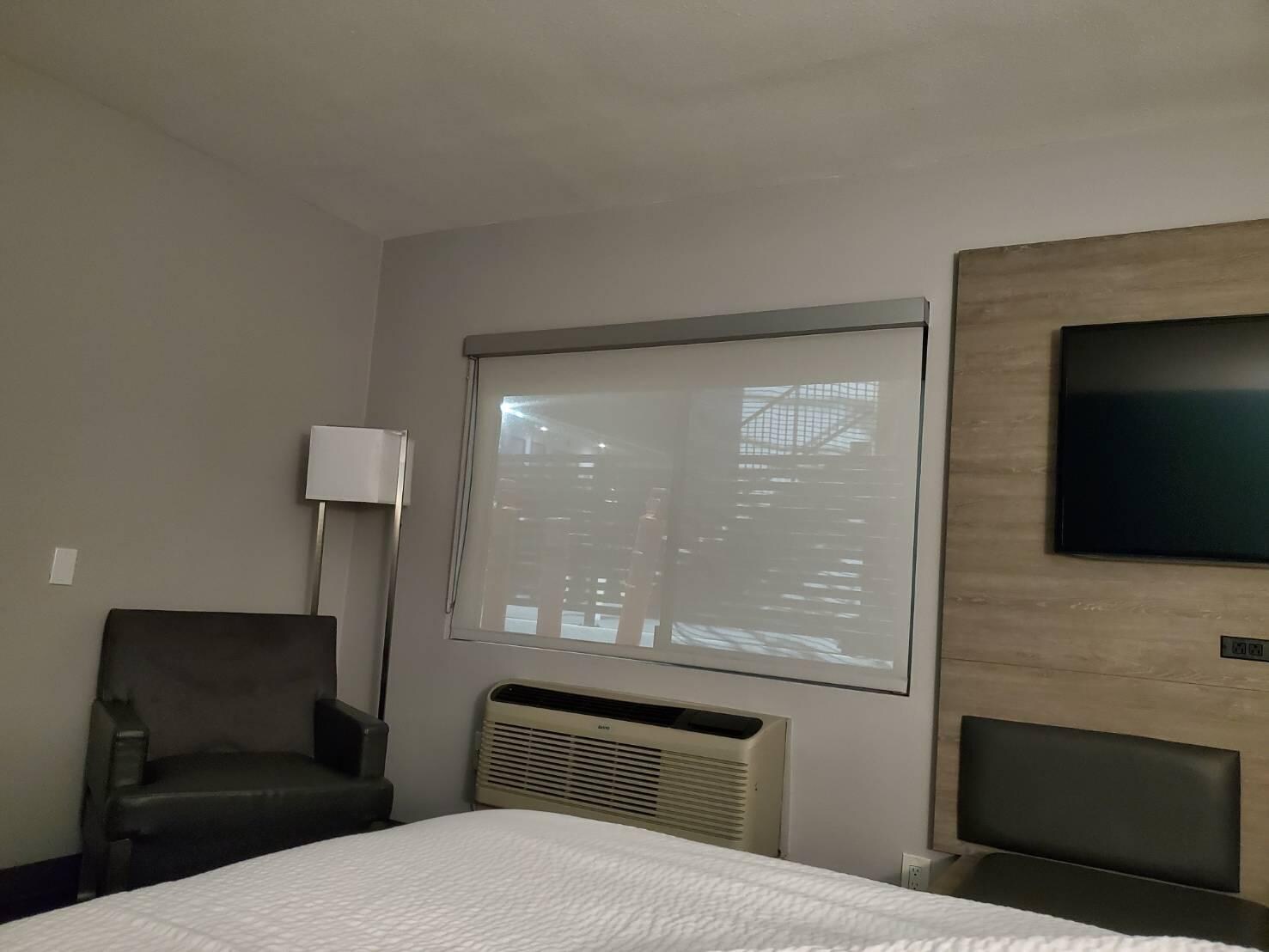 Room lights on. It is see-through from outside.