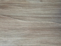 Faux wood furniture was warped and damaged from water.