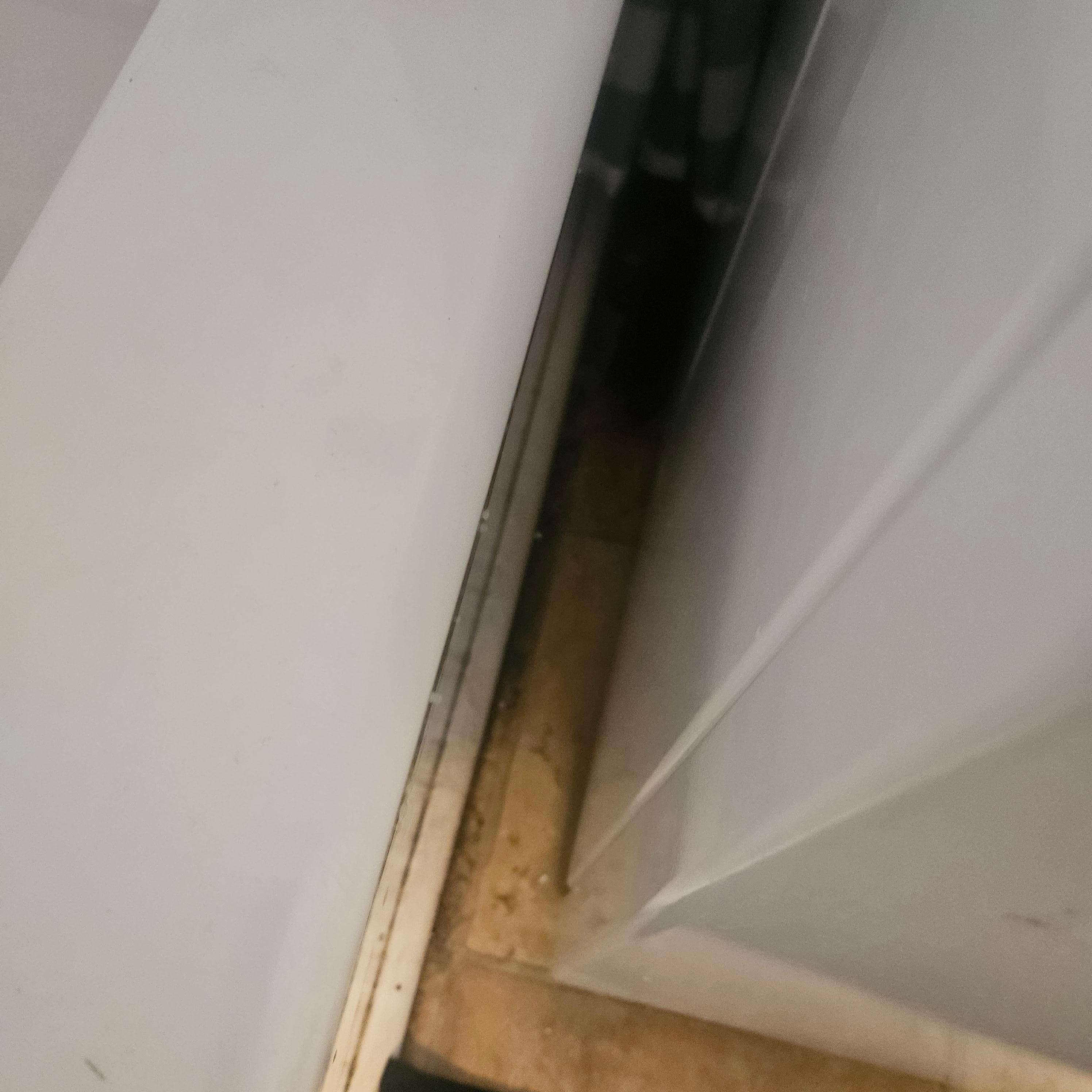 Space between washer and shower