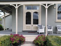 French doors of our room leading to garden. We had cup tea out on verandah with friends who visited us there.