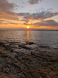 Sunset on the beach just across the street from the condo.