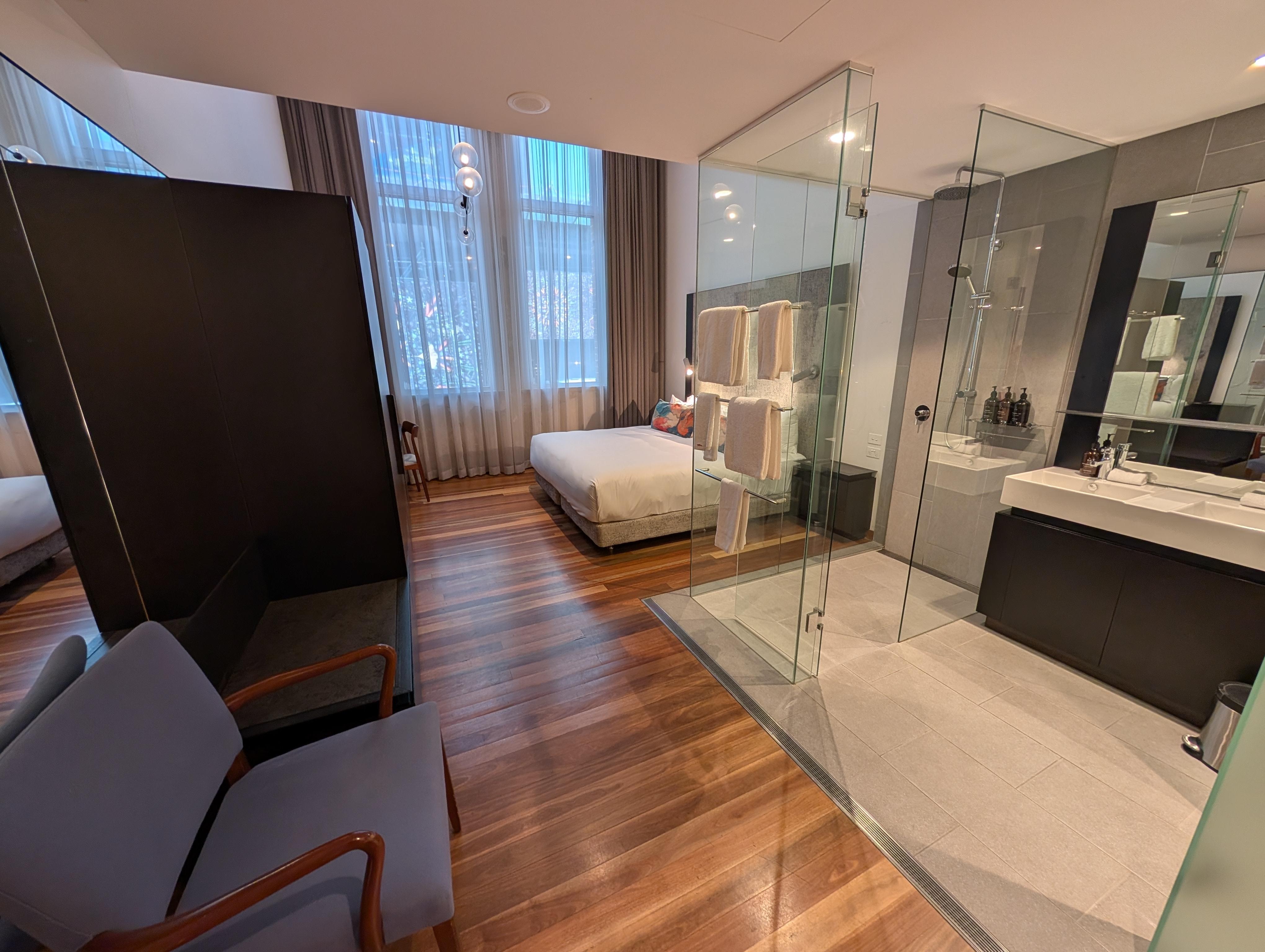 Note the all-glass shower stall with no curtains or shades.