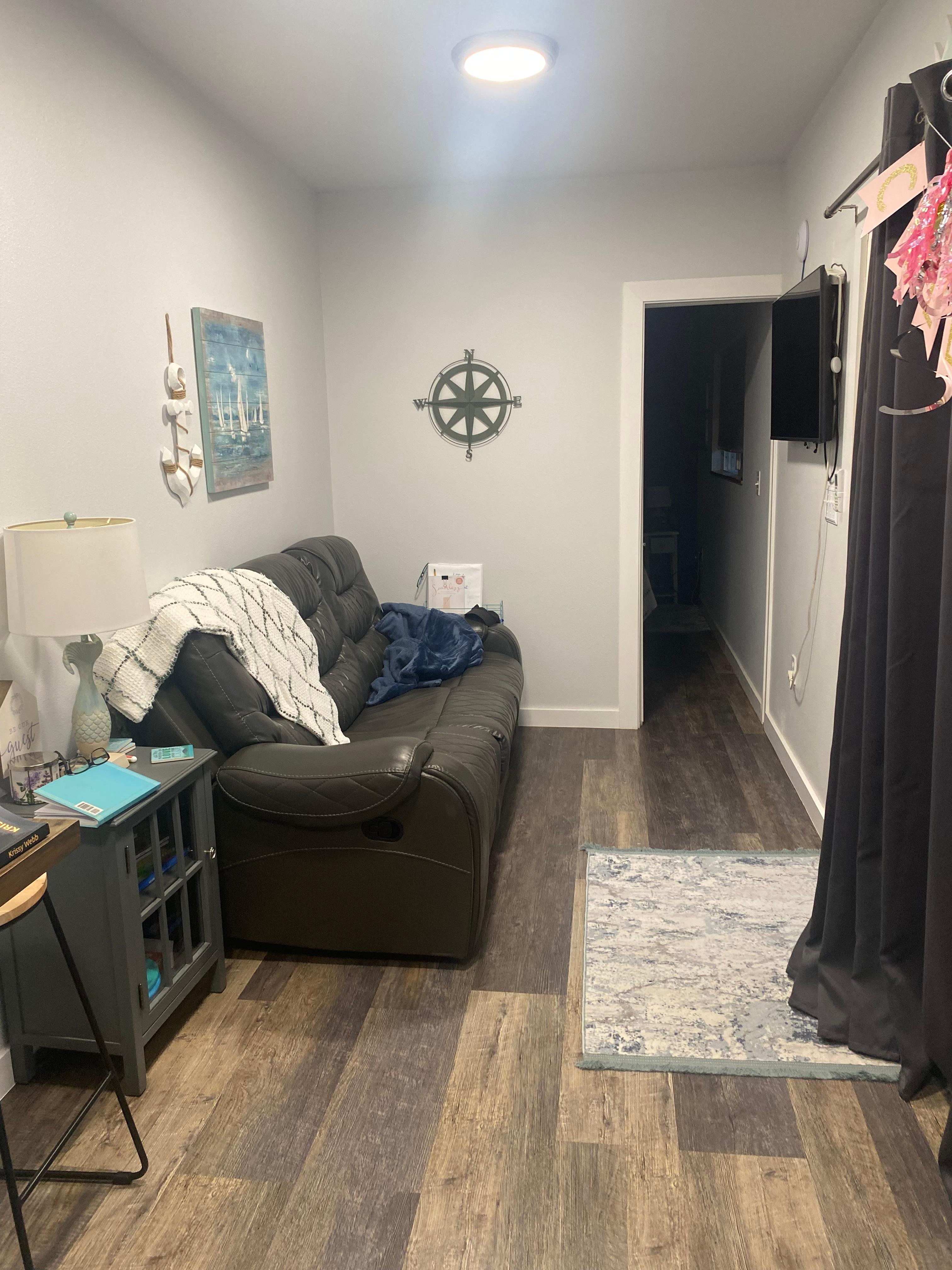 We didn’t spend much time inside but the couch was a great place to sit and read and have a view of the woods.