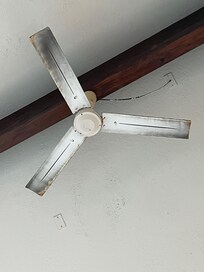 Grime-covered fan (second fan in similar condition)
