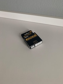 A new package of condoms in cabinet.