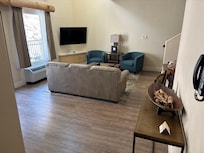 Living room and dining area in the 2 bedroom suite