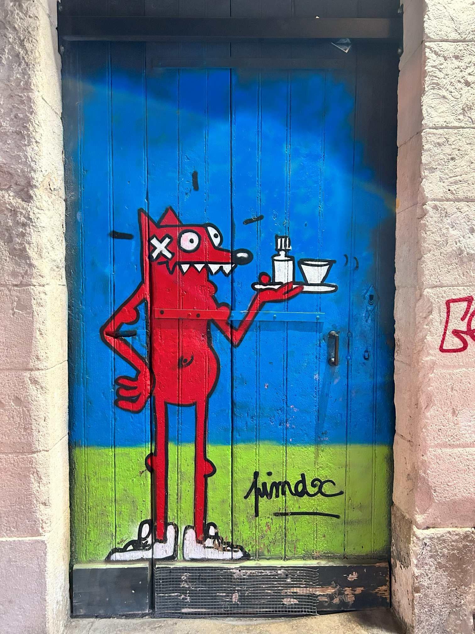 This is what the entry door looks like, it's right beside the Indian restaurant.