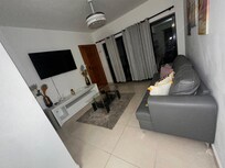 Nice living room area and balcony.
