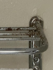 Rusted towel holder makes towels all rusted