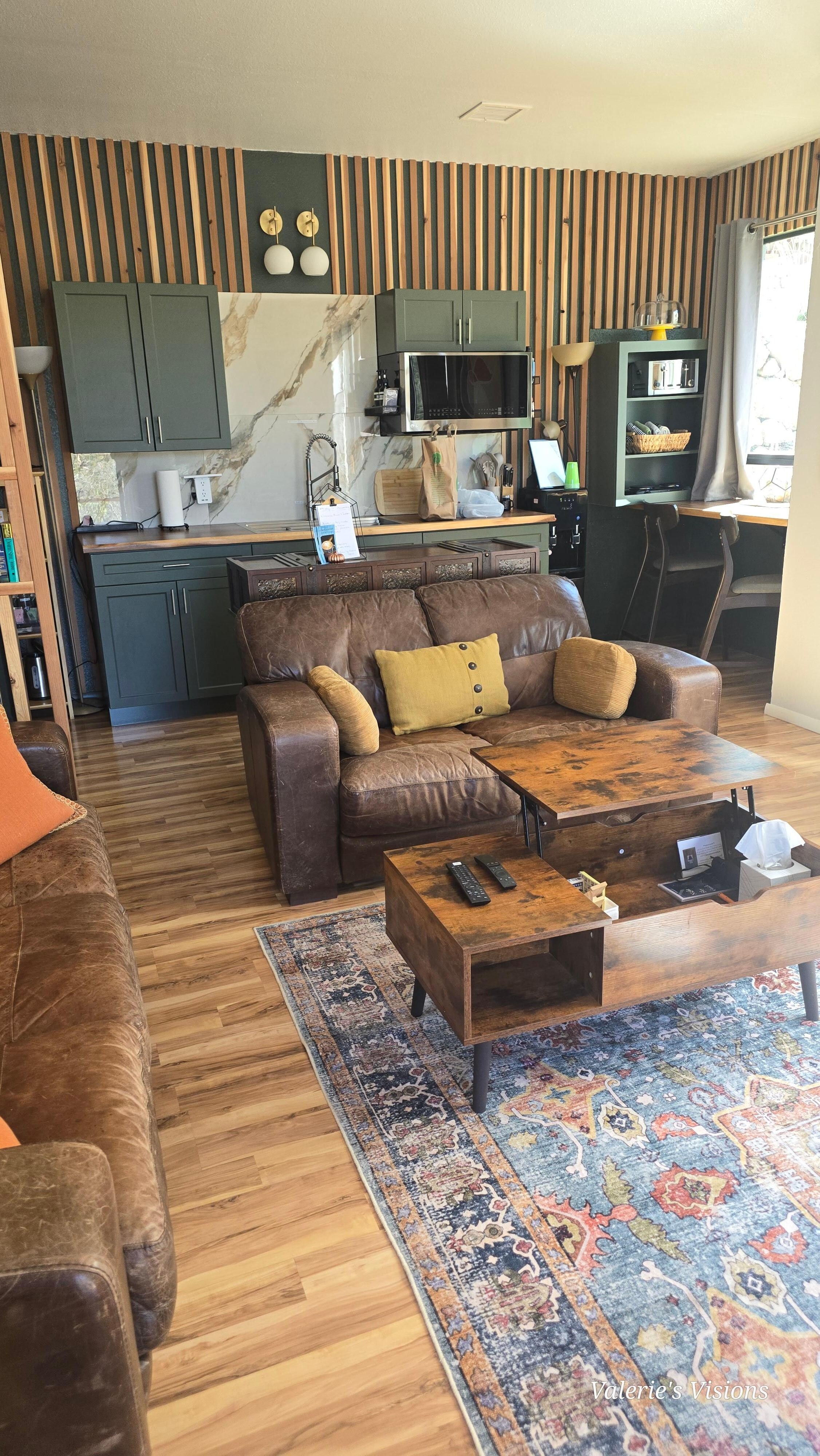 Cozy living kitchen area,  convect micro, toaster, toaster oven,  hot plate,  coffee station,  stackable w/d