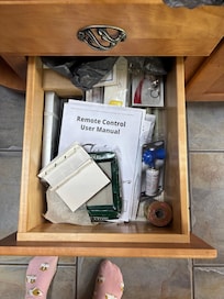 Multiple low junk drawers in the kitchen.
