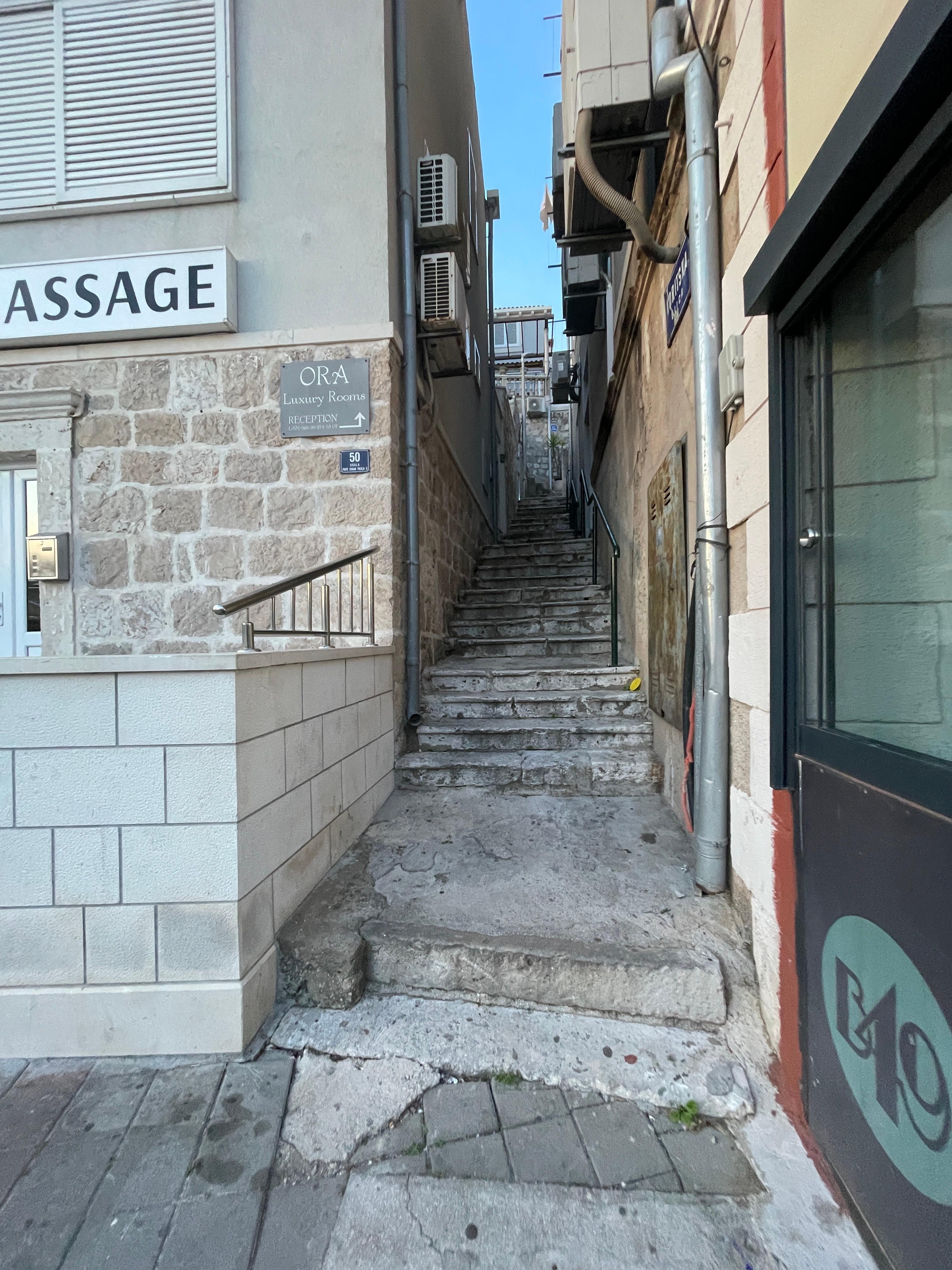Just a few steps up to the door on the left side 