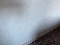 Dirty splash marks on wall