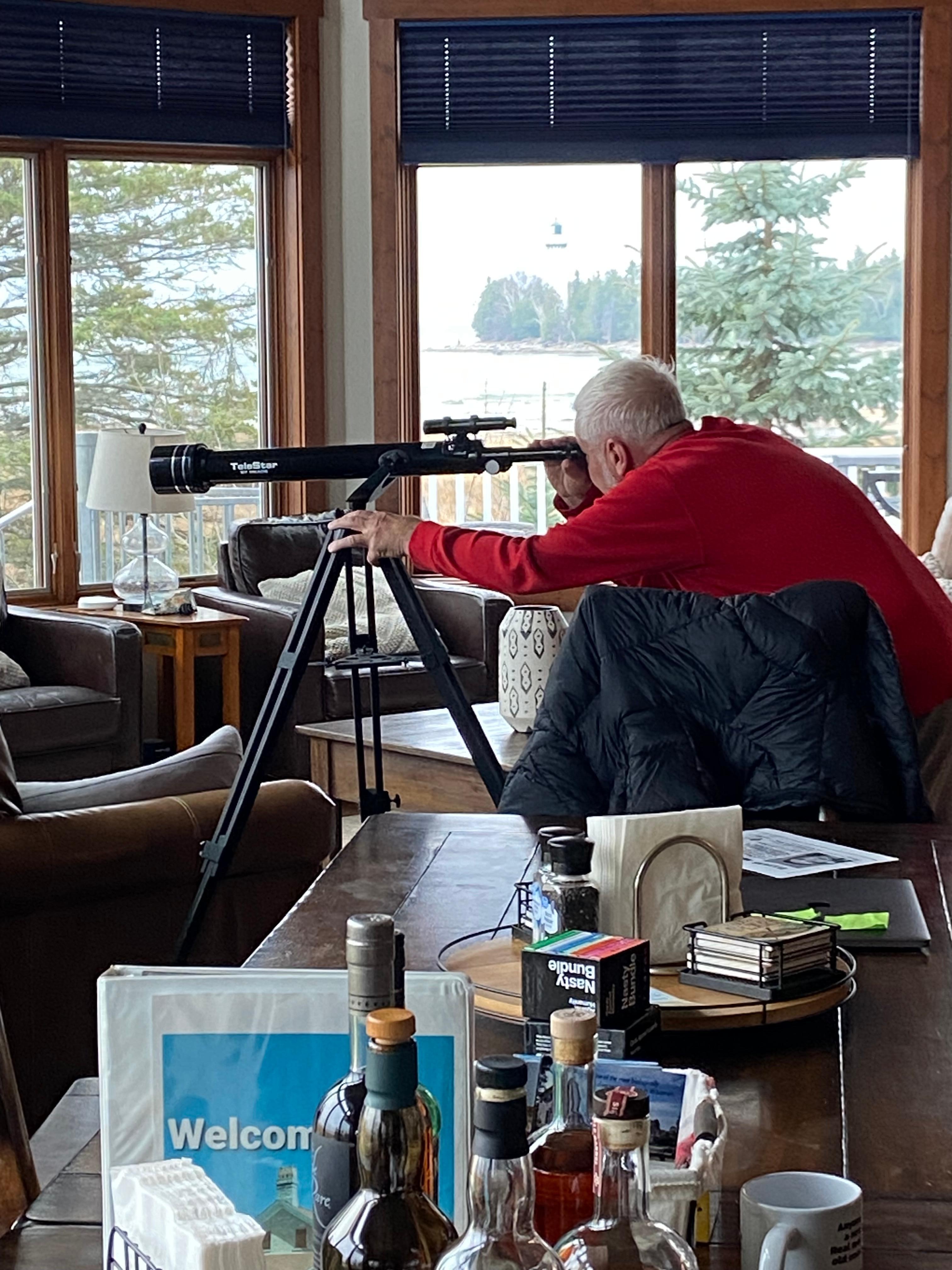 My husband watching the freighters on lake Michigan