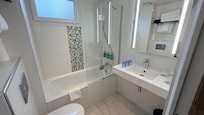 Bathroom, just off the half bedroom with twin bed