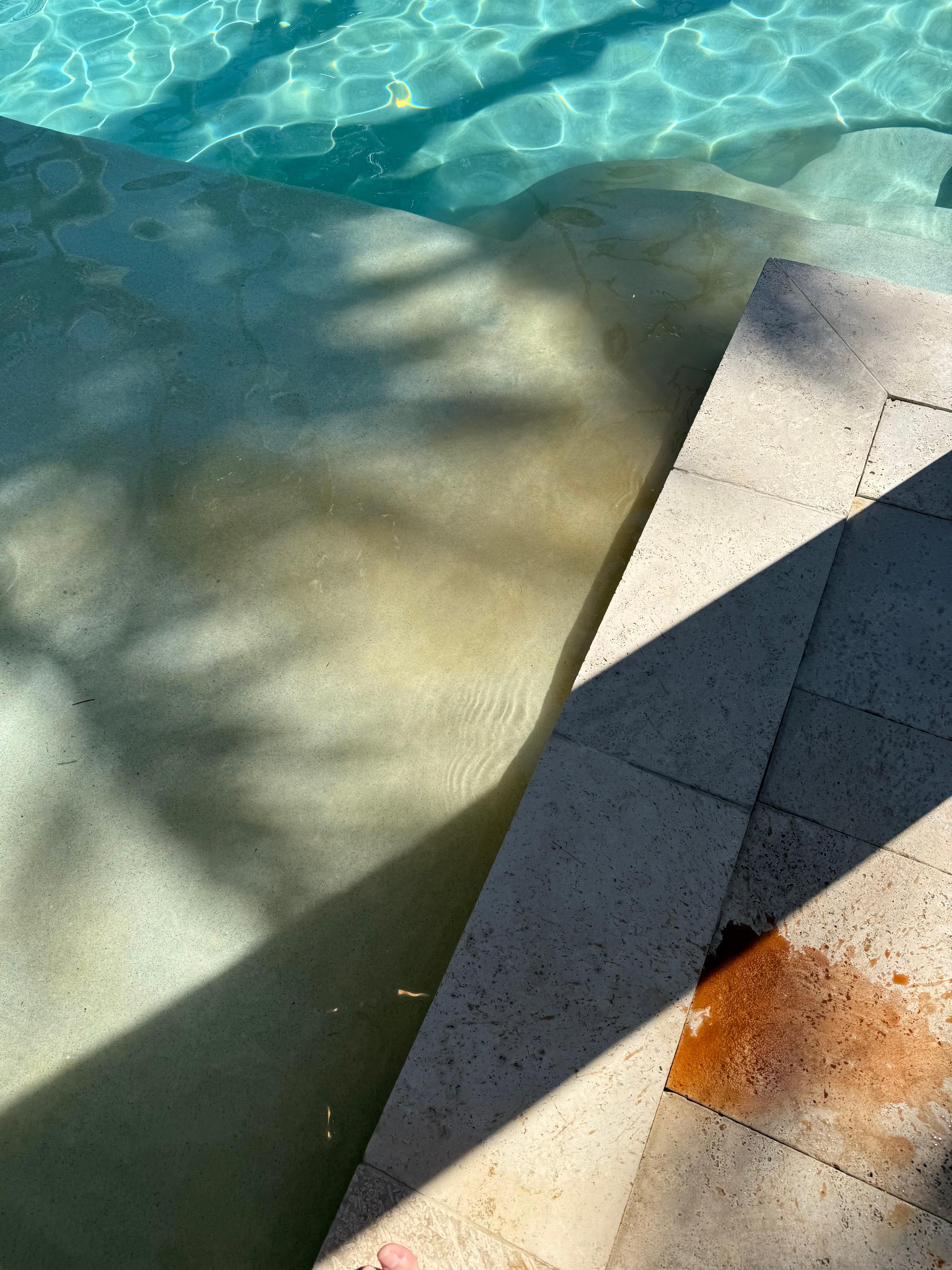 Discolored water from chair debris.