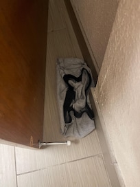Underwear behind the door.