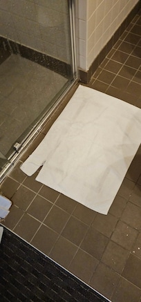 Torn bath mat