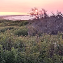 Sunset on the 17th hole of Rodd Crowbush Golf course