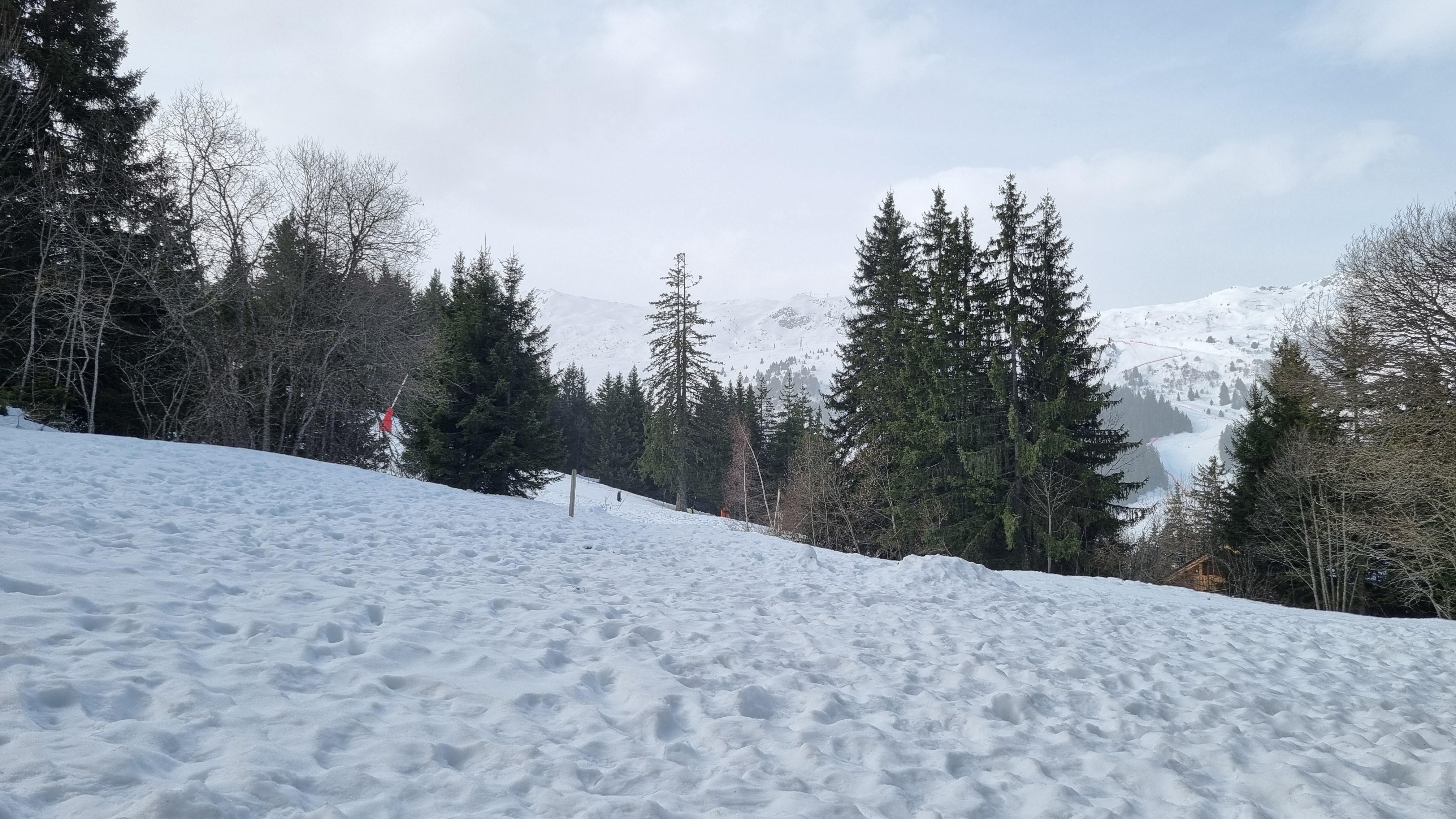View from the balcony/patio - no zoom. Ski in from just below Rond Point across the lumpy snow in the pic- ski out after a few steps to the right - easy!