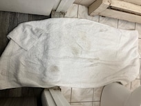 The towel after I wiped the filthy floor with it.