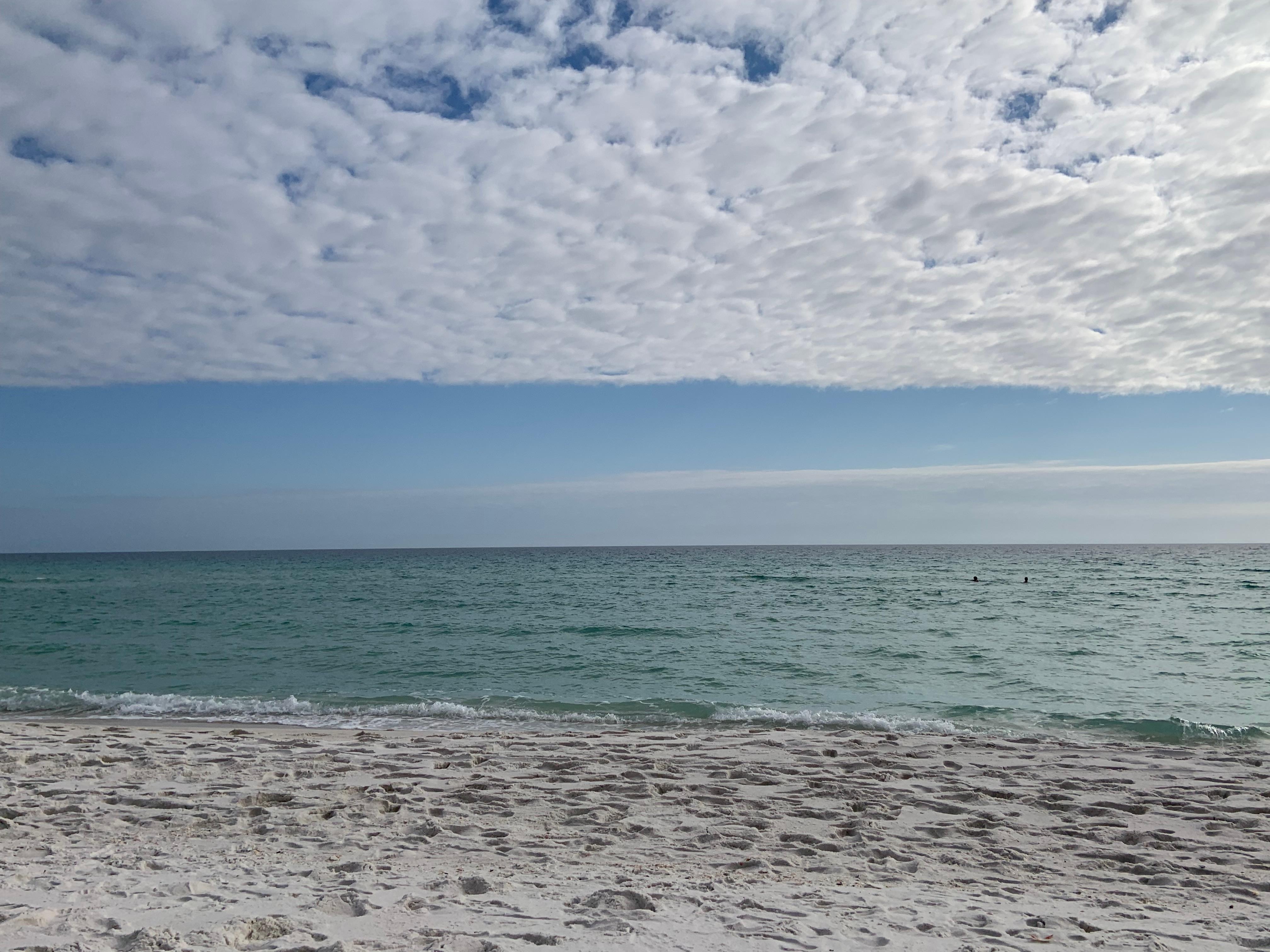 Beach less than 5 minutes down the road.