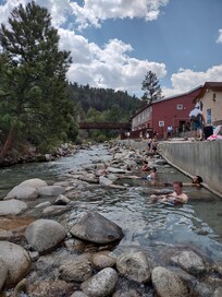 Soaking in the creek in a mixture of hot water from the creek bed and cold water from the mountains. Very cool!