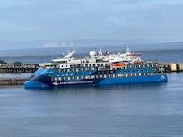 Cruise ship leaving Scrabster port, view from house