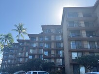 View from parking lot looking up at balcony