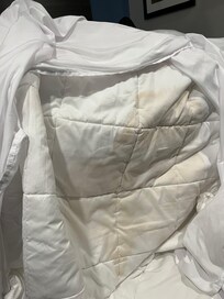 Stained comforter noticed on arrival and brought to attention of front desk. “Just throw it outside the door.” Like it happens every day I guess.