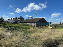Walking home - I believe the 3rd chimney from the left belongs to the cottage.