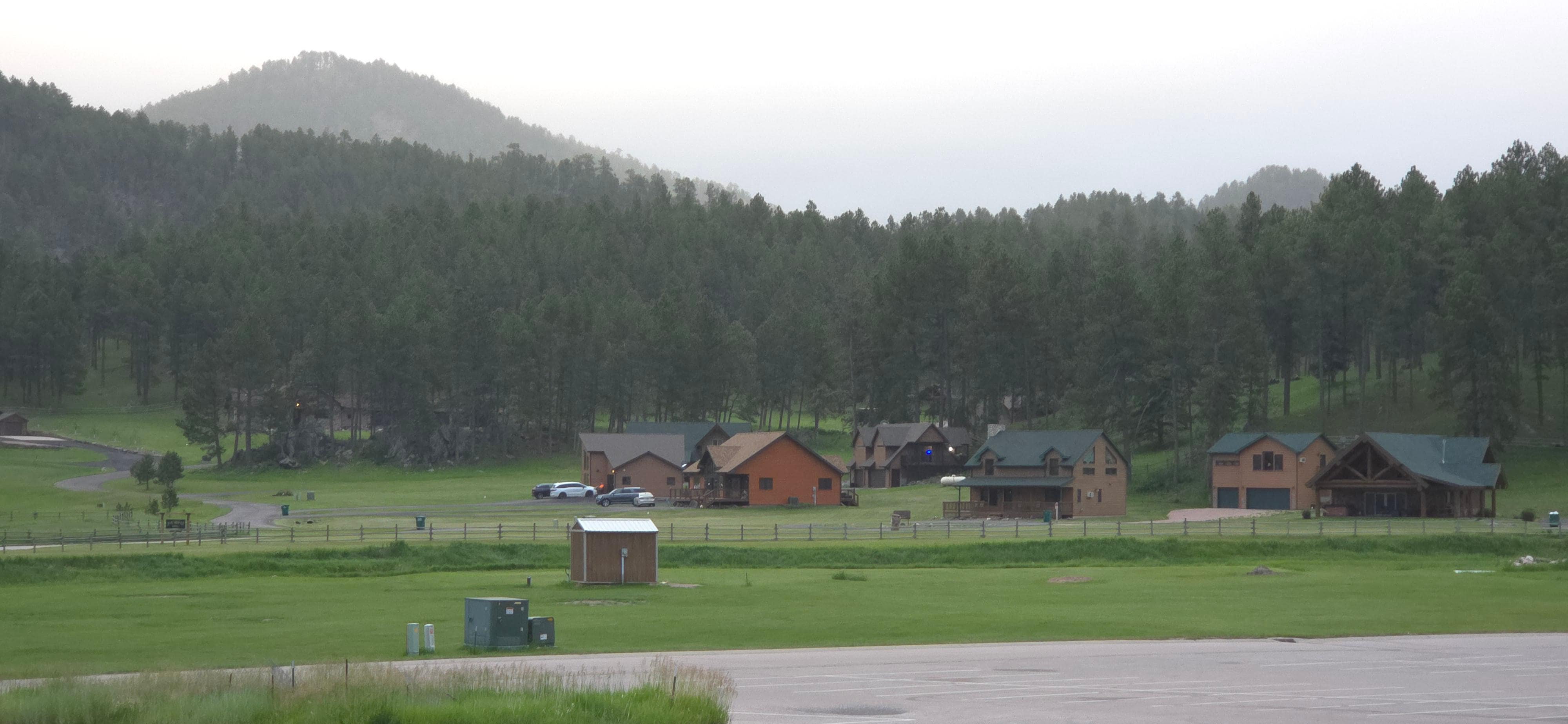 View from the gas station. Cabin is the one with the blue dot in the window, from the neon sign in the kitchen.