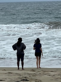 My girls dipping toes in the Pacific Ocean, just a short walk away.