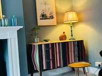 Sitting room. Love the sideboard!