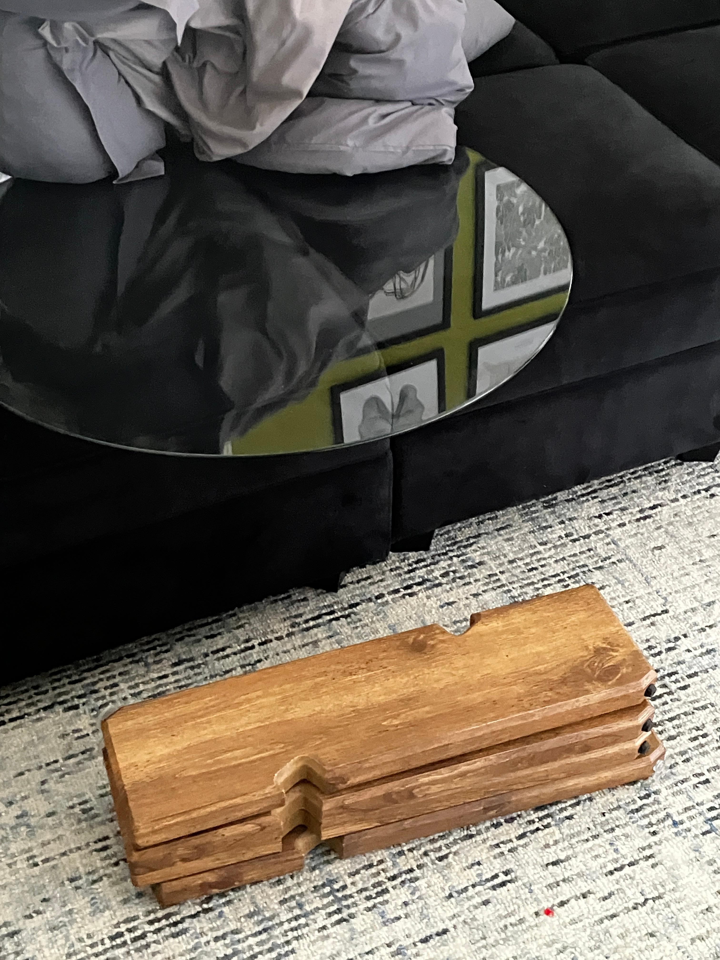 Hazardous Glass Table with Puzzle Legs which you had to Move to access Pull out Couch