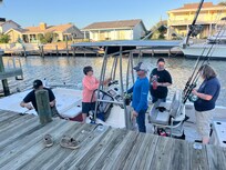 Taking the boat out from the pie outside of the rental