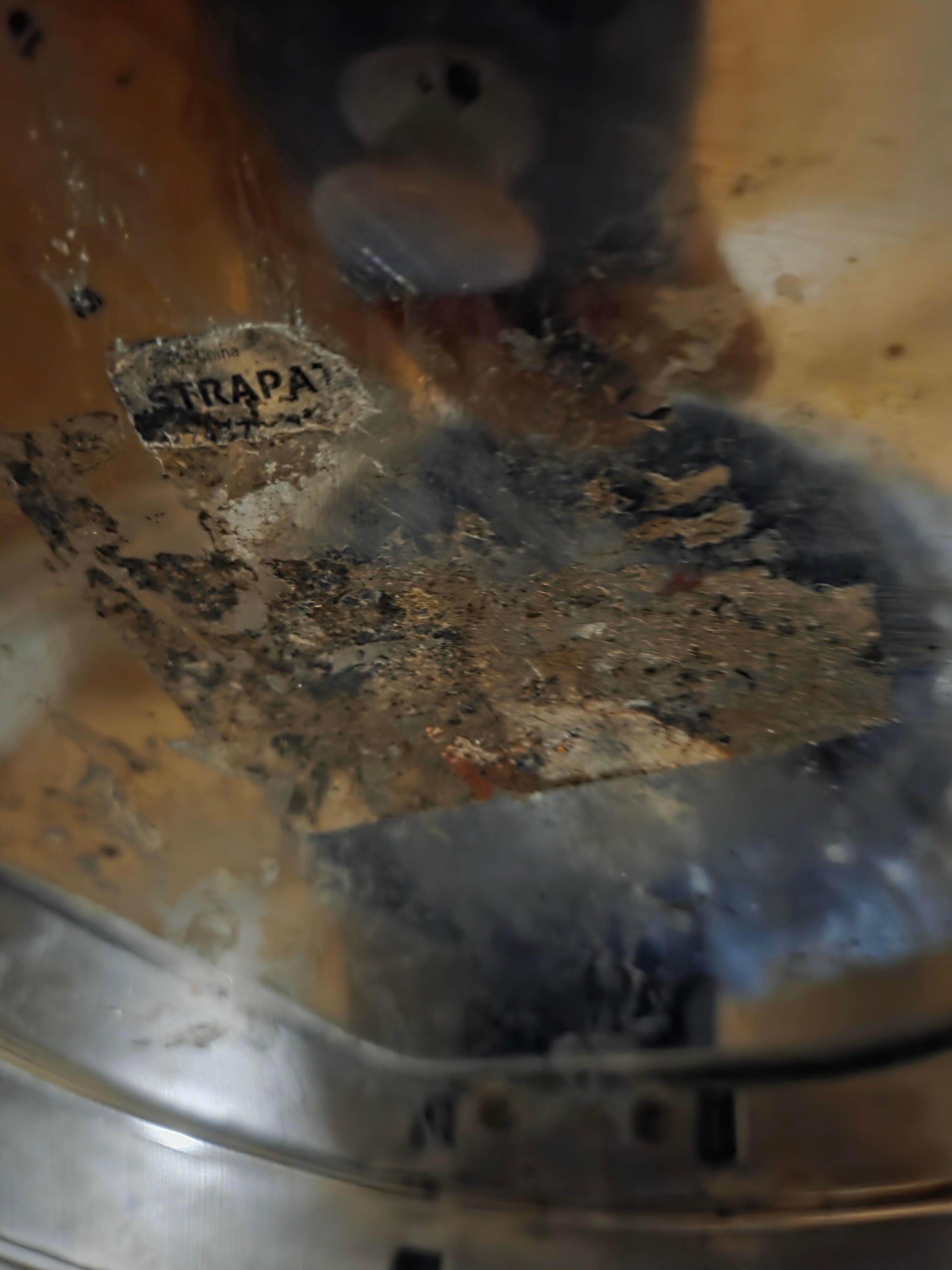 Lid of trash can being used as ash tray