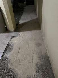 Tons of sand on walkway