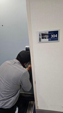 The person trying to get us in our room