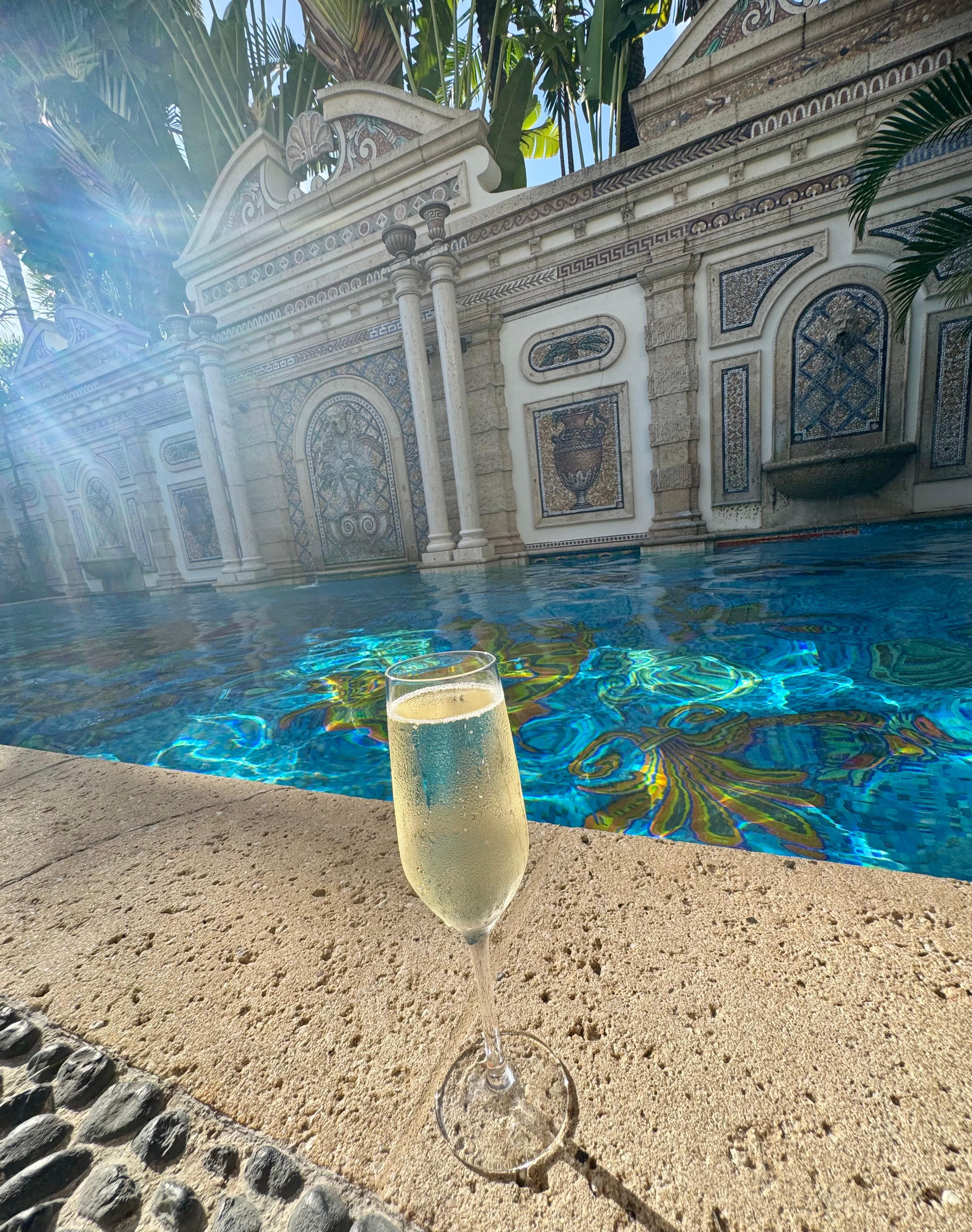 Champagne by the most beautiful pool!