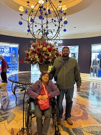 The person doing maintenance on these flowers was so nice and was happy to take this picture of me and my mom