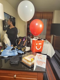 Birthday cake, balloons, and a hand written card for the birthday girl! Thank you