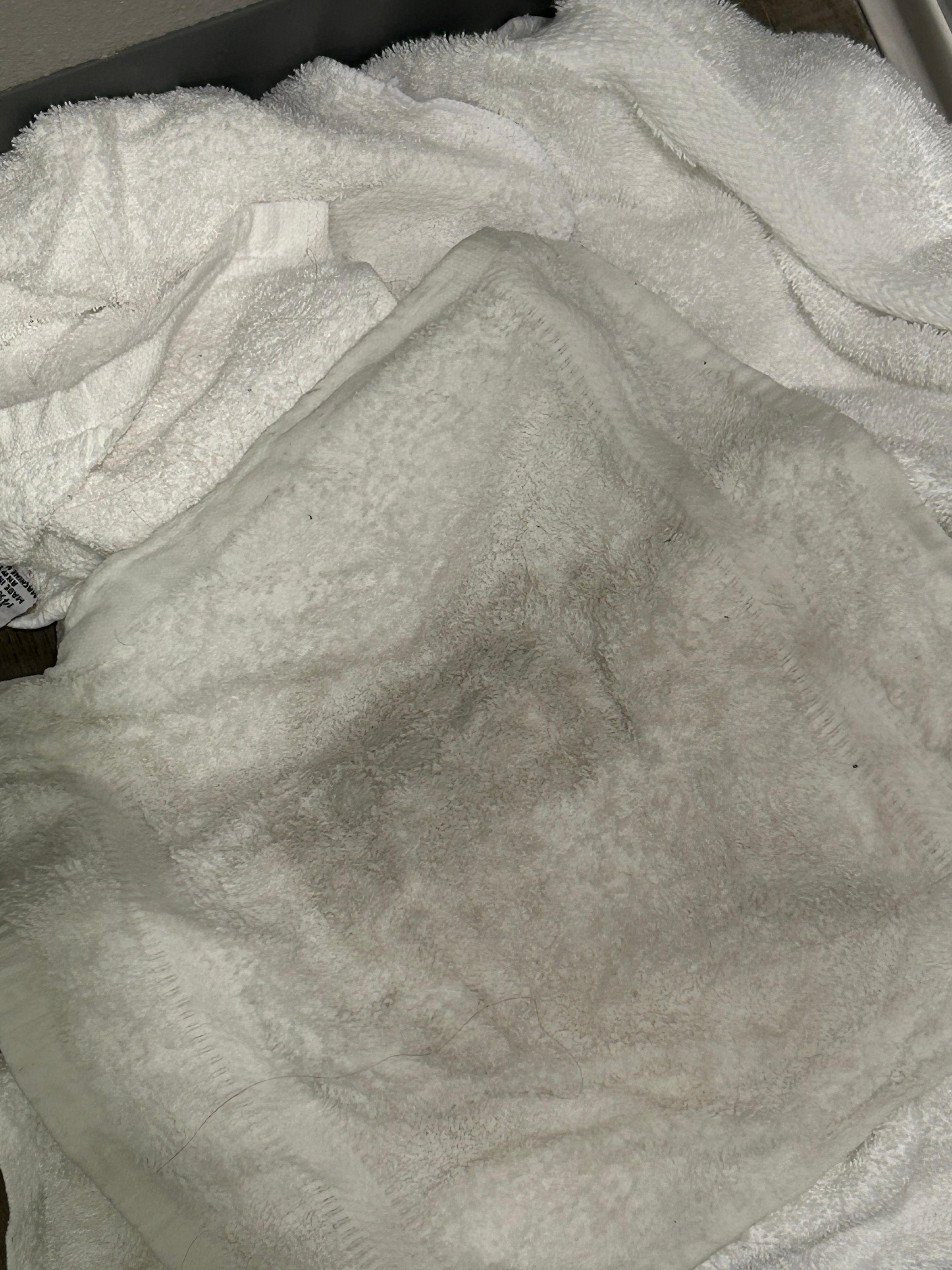 Wiped bathroom floor after our feet were turning black from walking on floor.