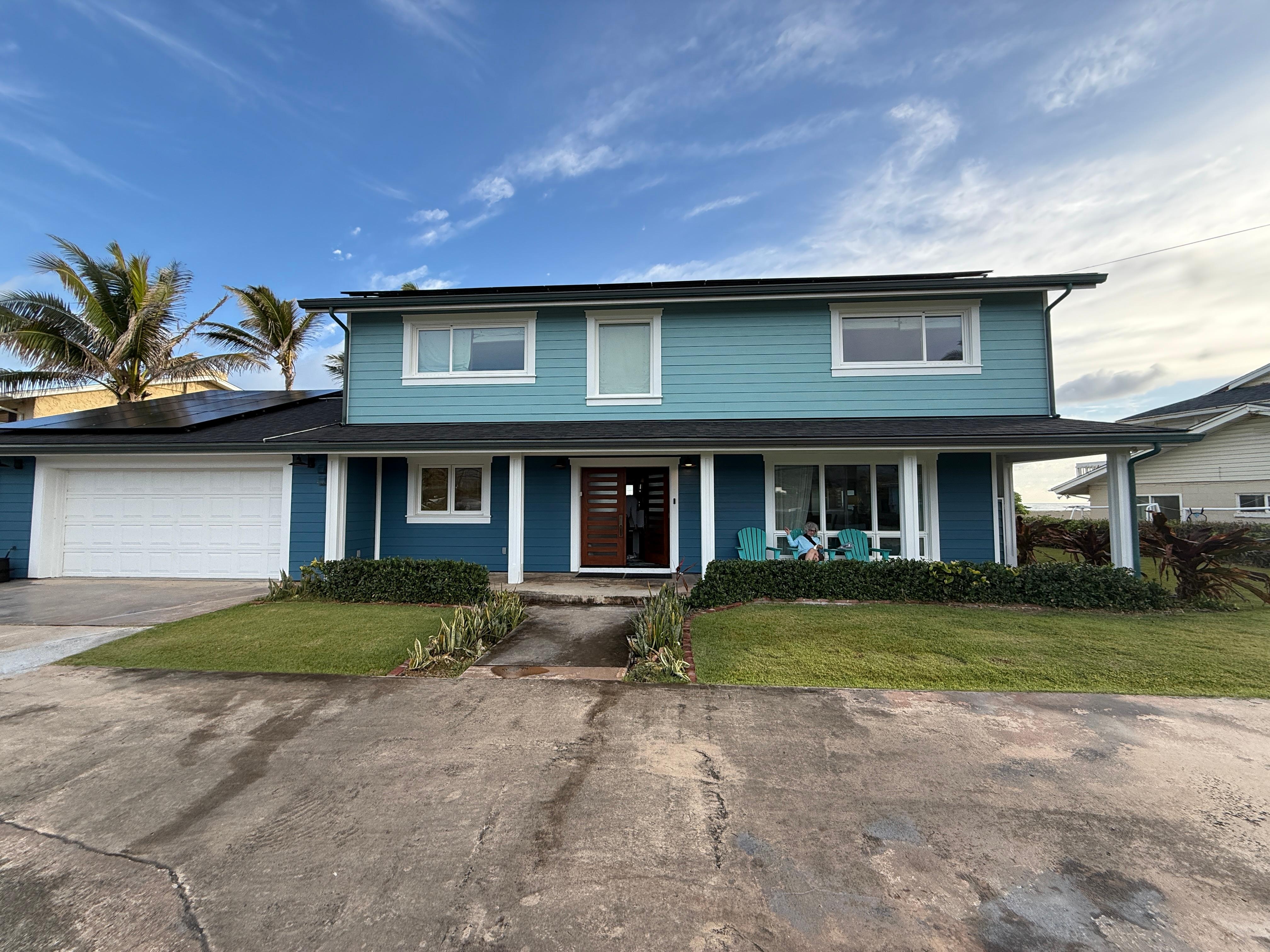 Front of house with a great front porch and seating 