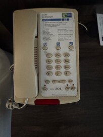 Telephone not working. I had a different room number on it.